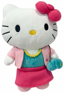 Plush fashion stylist character: white cat with pink bow, pearl necklace, teal dress, pink skirt.