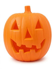 Orange jack-o'-lantern pumpkin decoration with carved face cutouts