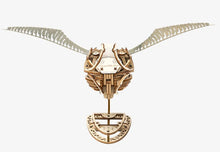 Wooden Golden Snitch construction craft model, centered with open wing span