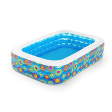 Inflatable play pool with floral print, blue water, and white rim