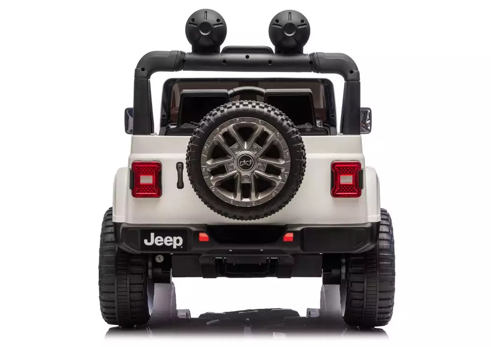 White Jeep Rubicon-style ride-on vehicle, rear view with spare tire and tail lights