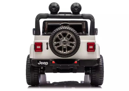 White Jeep Rubicon-style ride-on vehicle, rear view with spare tire and tail lights