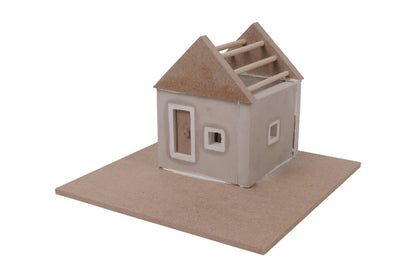 Precast Home Kit house model on a base board, with roof and window details