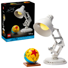 White LEGO Pixar lamp with adjustable head and warm yellow spotlight