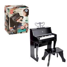 Black upright piano toy with keyboard and attached bench for kids learning