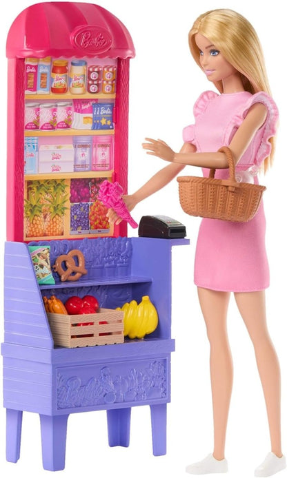 Market doll playset: blonde doll in pink dress holding a basket by a grocery stall