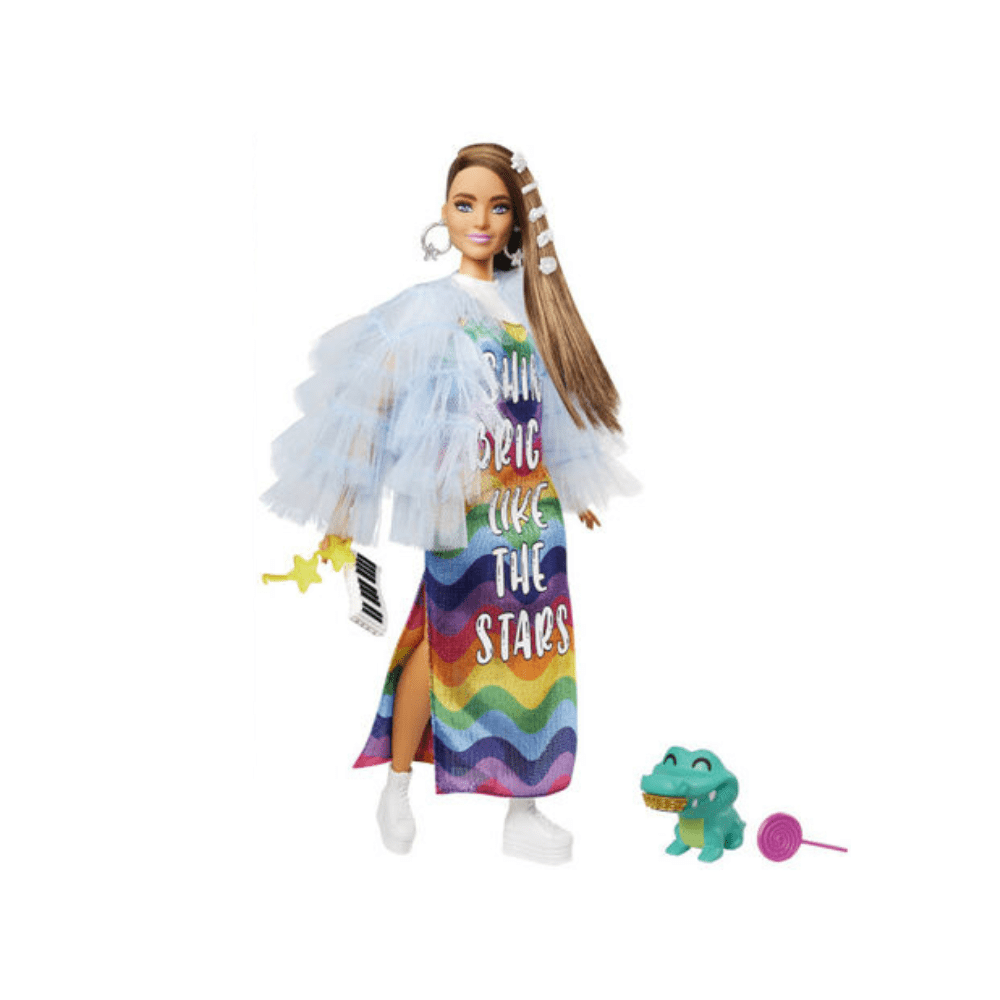 Blue doll with white tulle overskirt, rainbow graphic dress, white boots, star earrings