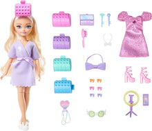 Barbie Malibu doll figure in lavender dress with bow and included accessories