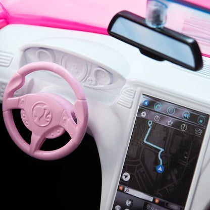 Pink convertible dashboard with touchscreen display and pink steering wheel