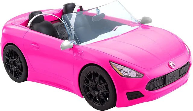 Pink convertible toy car front three-quarter view; black tires, headlight and grille