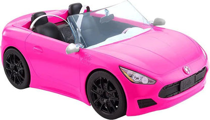 Pink convertible toy car front three-quarter view; black tires, headlight and grille