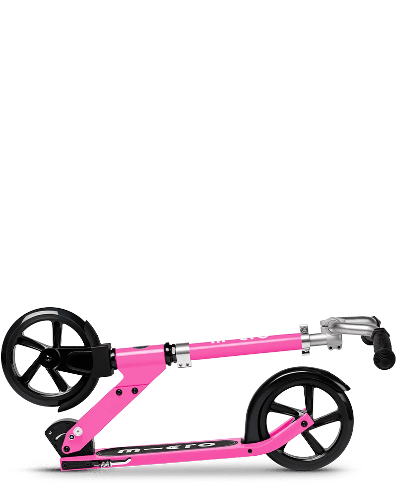Cruiser Pink kick scooter side view, pink frame and deck, black wheels