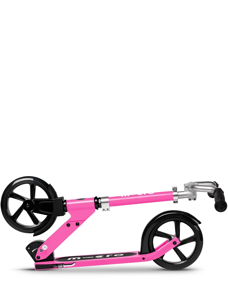 Pink folding kick scooter with black wheels and silver handlebar