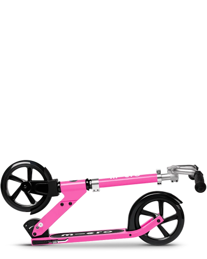 Pink folding kick scooter with black wheels and silver handlebar