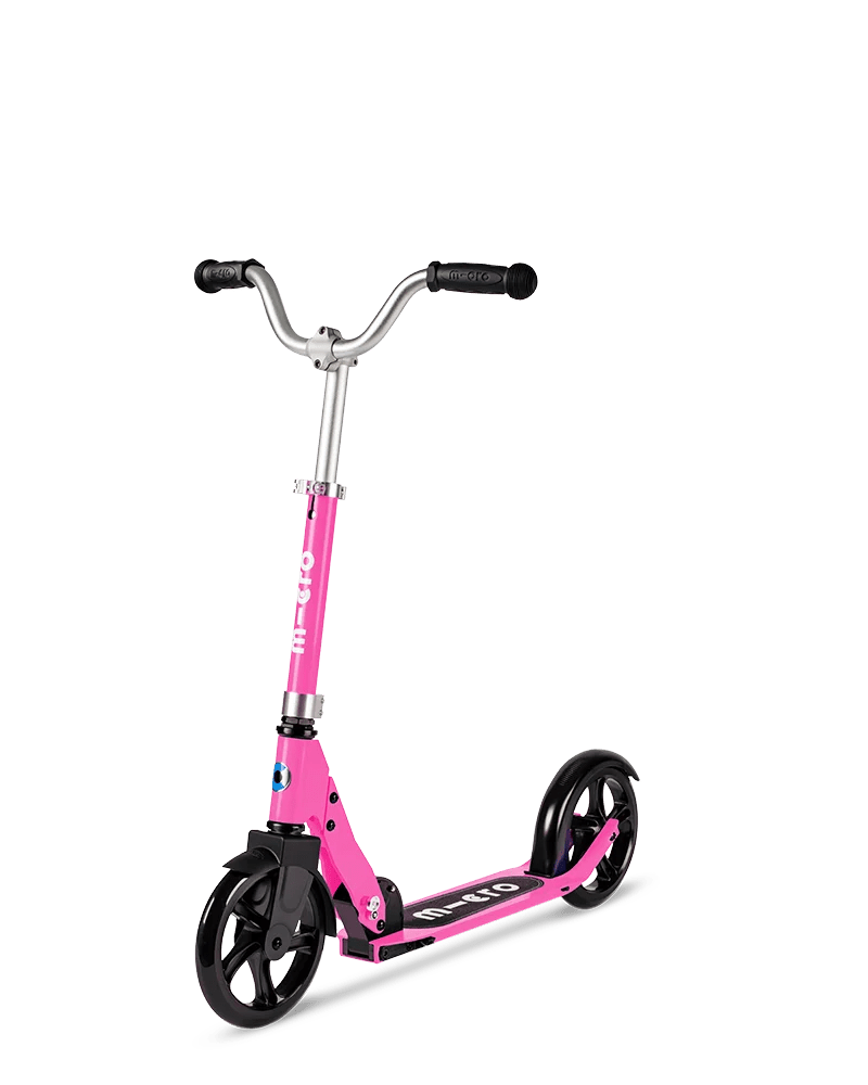 Micro Cruiser Pink scooter with pink deck, black wheels, twin handlebar grips