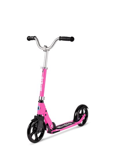 Micro Cruiser Pink scooter with pink deck, black wheels, twin handlebar grips