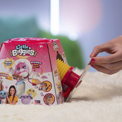 Inflatable toy kit box with pump parts, hand pulling open the package.