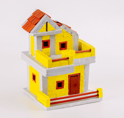 Two-level block-built house model with gray base, red doors, yellow walls, orange roof