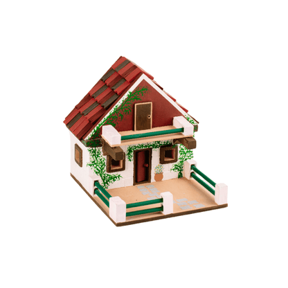 Painted cottage dollhouse model with red roof, white walls, green fence and patio