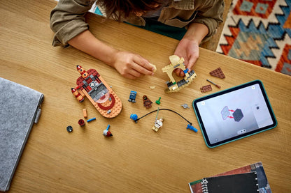 Luke's Landspeeder LEGO pieces with tablet showing interactive Smart Play view