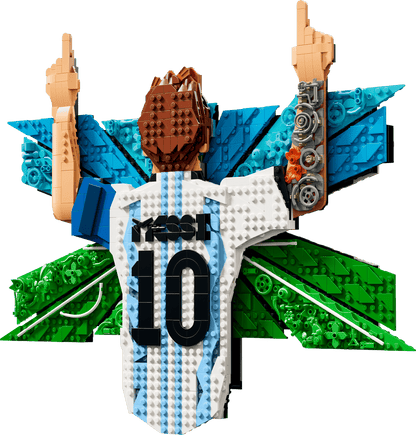 Assembled brick figure with arms raised, brown head, white-blue torso, and green wings
