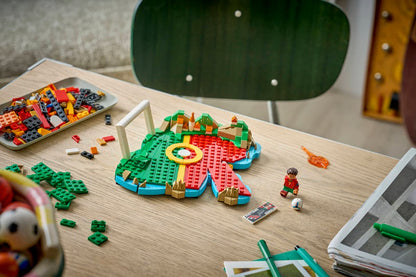 LEGO soccer highlights scene on a table with player mini figure and small parts