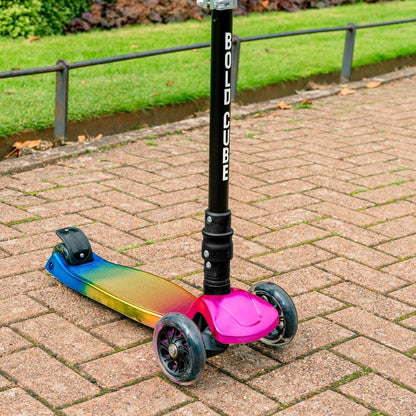 3-wheel kids scooter with pink front fender, rainbow deck, and three black wheels