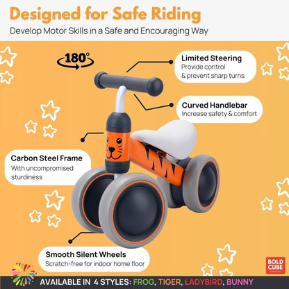 Orange tiger balance bike with white seat, gray wheels, and curved handlebars