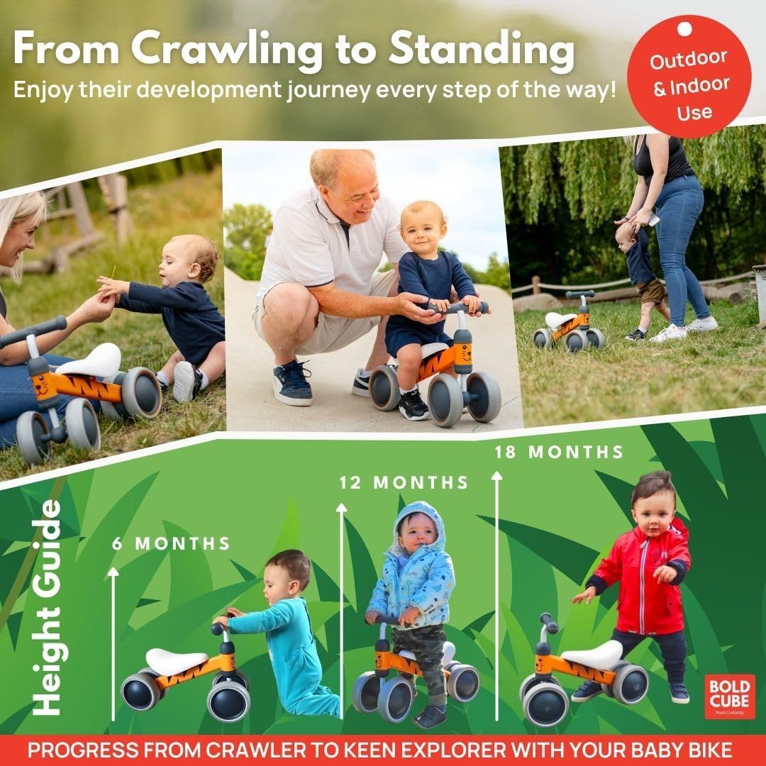 Tiger orange baby balance bike with white seat and gray wheels