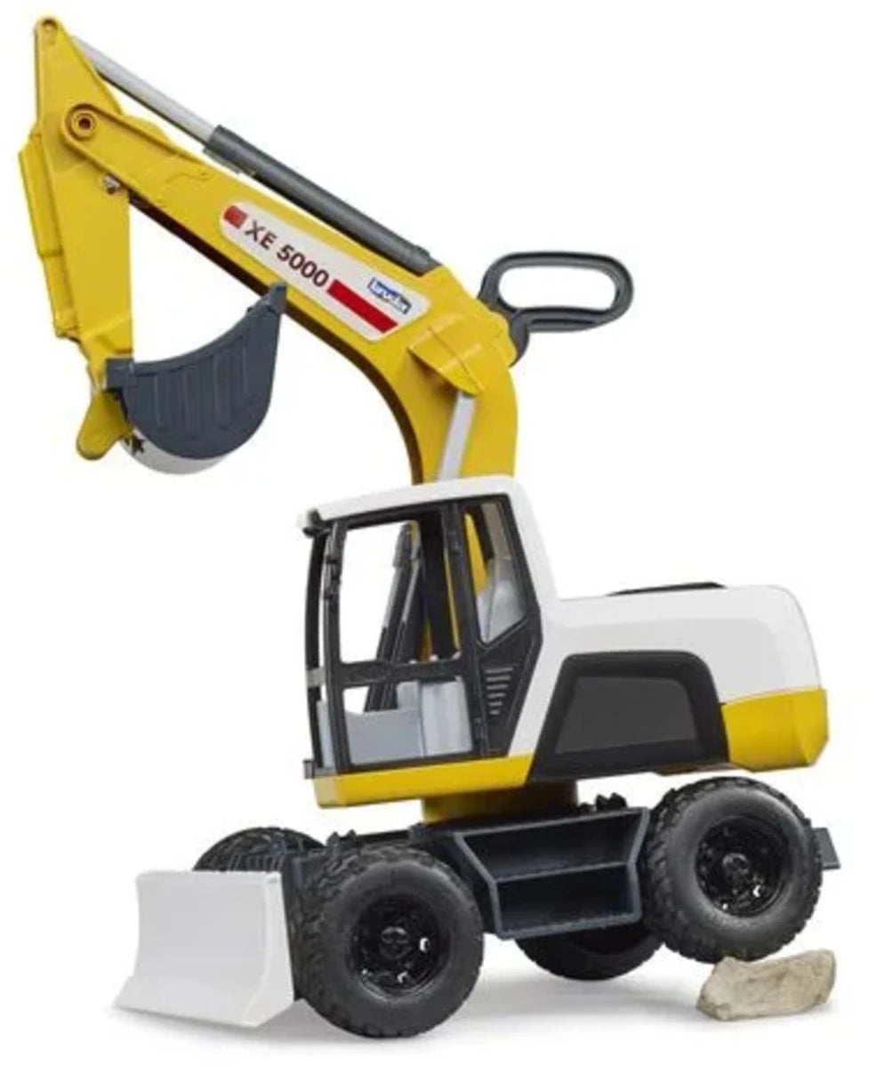 Bruder excavator toy with yellow arm, dark bucket, cab, and four black tires
