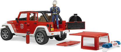 Red fire brigade Jeep Wrangler toy with open rear, firefighter figure, and accessories