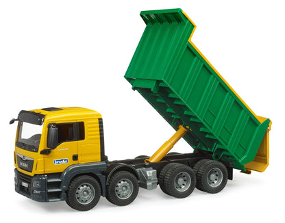 Yellow MAN TGS tipper truck with green raised dump bed and cab, front side view