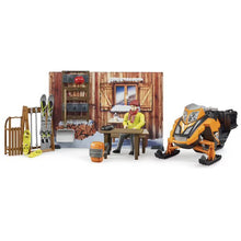 Mountain Resort miniature figurine and orange snowmobile with winter accessories