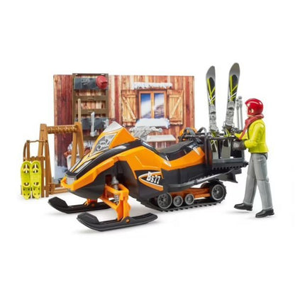 Orange snowmobile with driver figurine and ski racks, plus ski accessories
