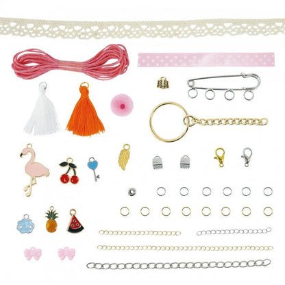 Assorted jewelry making parts: tassels, chains, charms, rings, and earring hooks