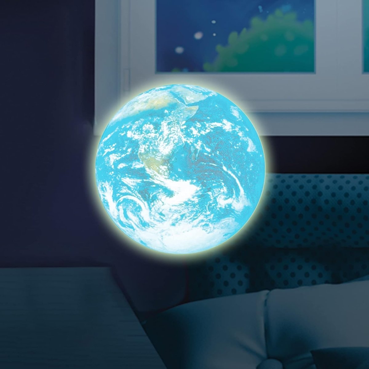 Blue Earth glow-in-dark light sticker on wall