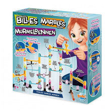 Marble run set box with colorful track pieces and smiling child character