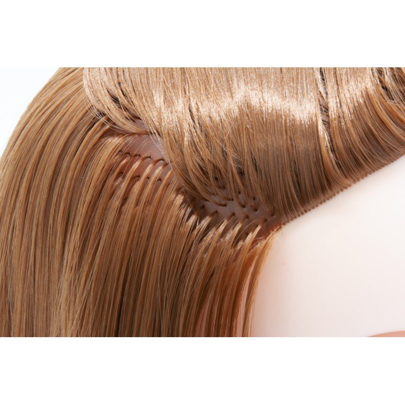Professional Studio Hair brown hairpiece strands with stitched weft detail