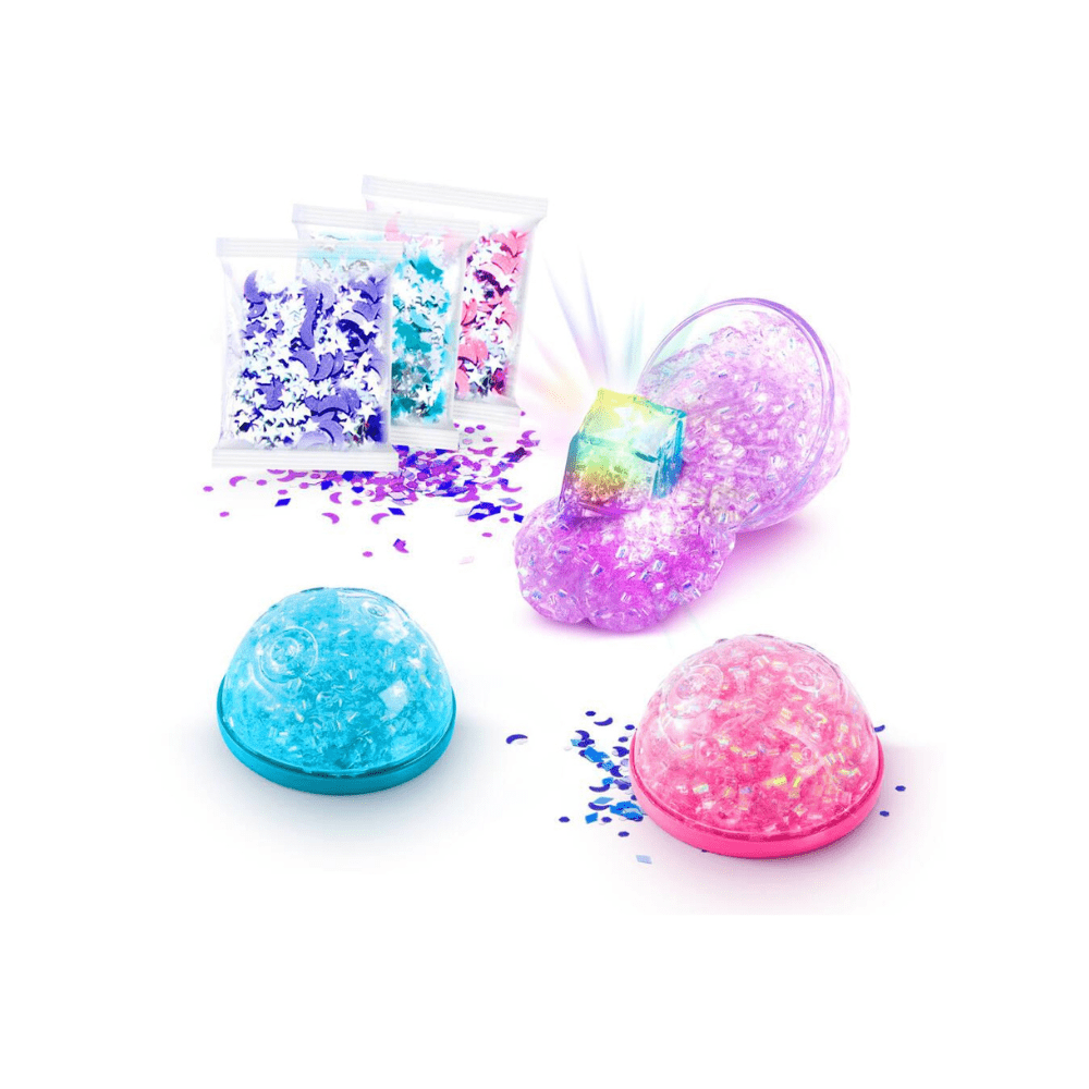 Three light-up cosmic slime domes in blue, purple, and pink with confetti sprinkles