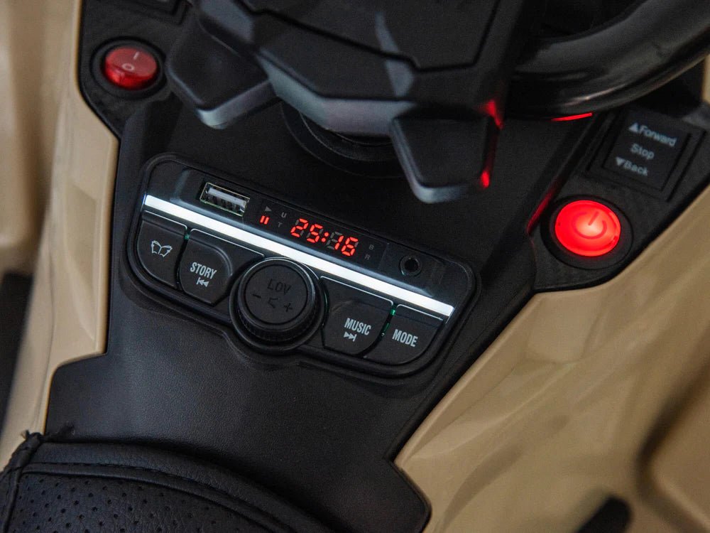 Kids ATV control panel with digital display, red power buttons, and audio controls