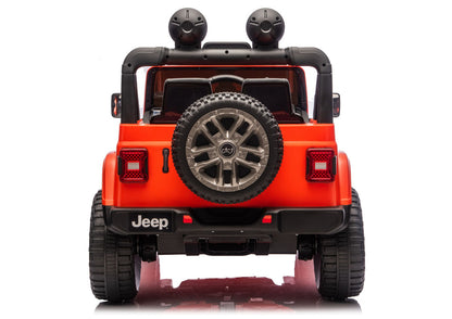 Orange Jeep Rubicon-style ride-on vehicle, rear view with spare tire and tail lights