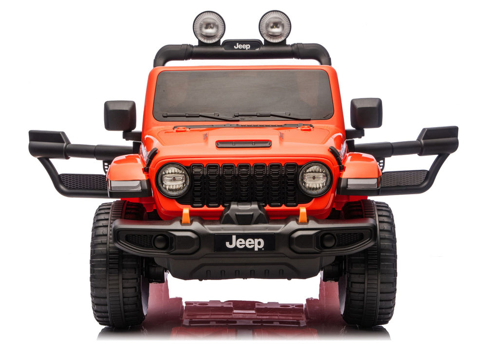 Orange Jeep Rubicon-style ride-on vehicle, front view with push bar and headlights