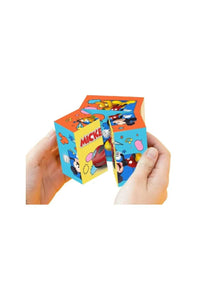 Mickey Mouse cube puzzle held in hands, shown from side with character artwork