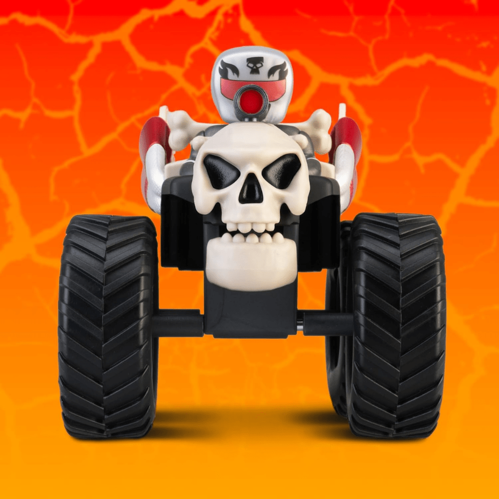 Skull rider quad bike with black and white body, red accents, four large chunky tires.
