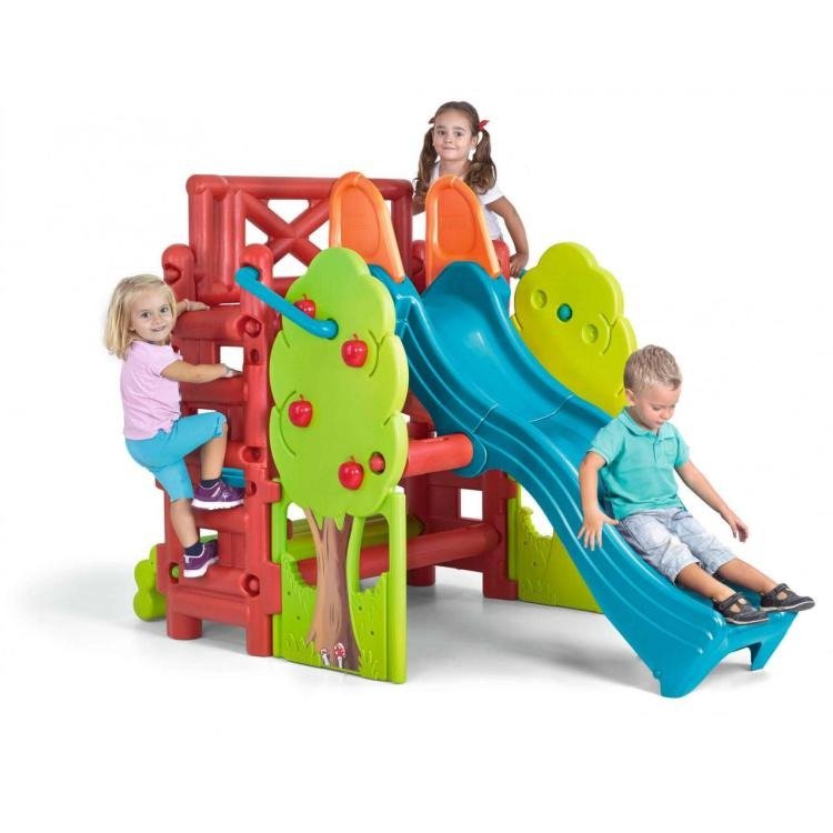Feber wooden playhouse slide with children on the blue slide, red frame, green tree panels