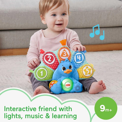 Blue penguin learning toy with numbered fabric wings and light-up button center