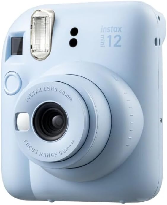Close-up of blue Instax Mini 12 camera lens and flash unit.