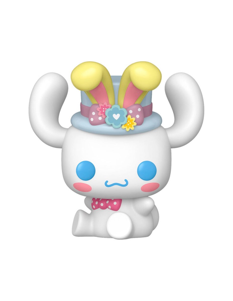 Cinnamoroll vinyl figure with yellow bunny ears, pink bow collar and blue eyes