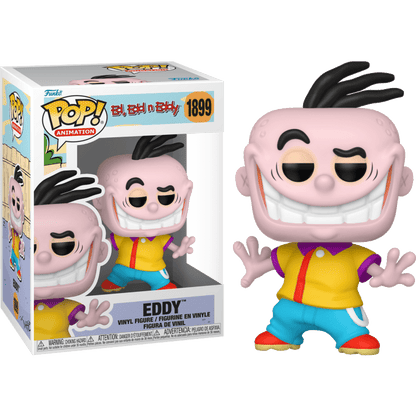 Eddy vinyl figure and packaging, black hair spikes, grin, yellow shirt with red stripe, teal shorts