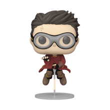 Harry Potter vinyl figure with round glasses, dark hair, red coat, wand in hand
